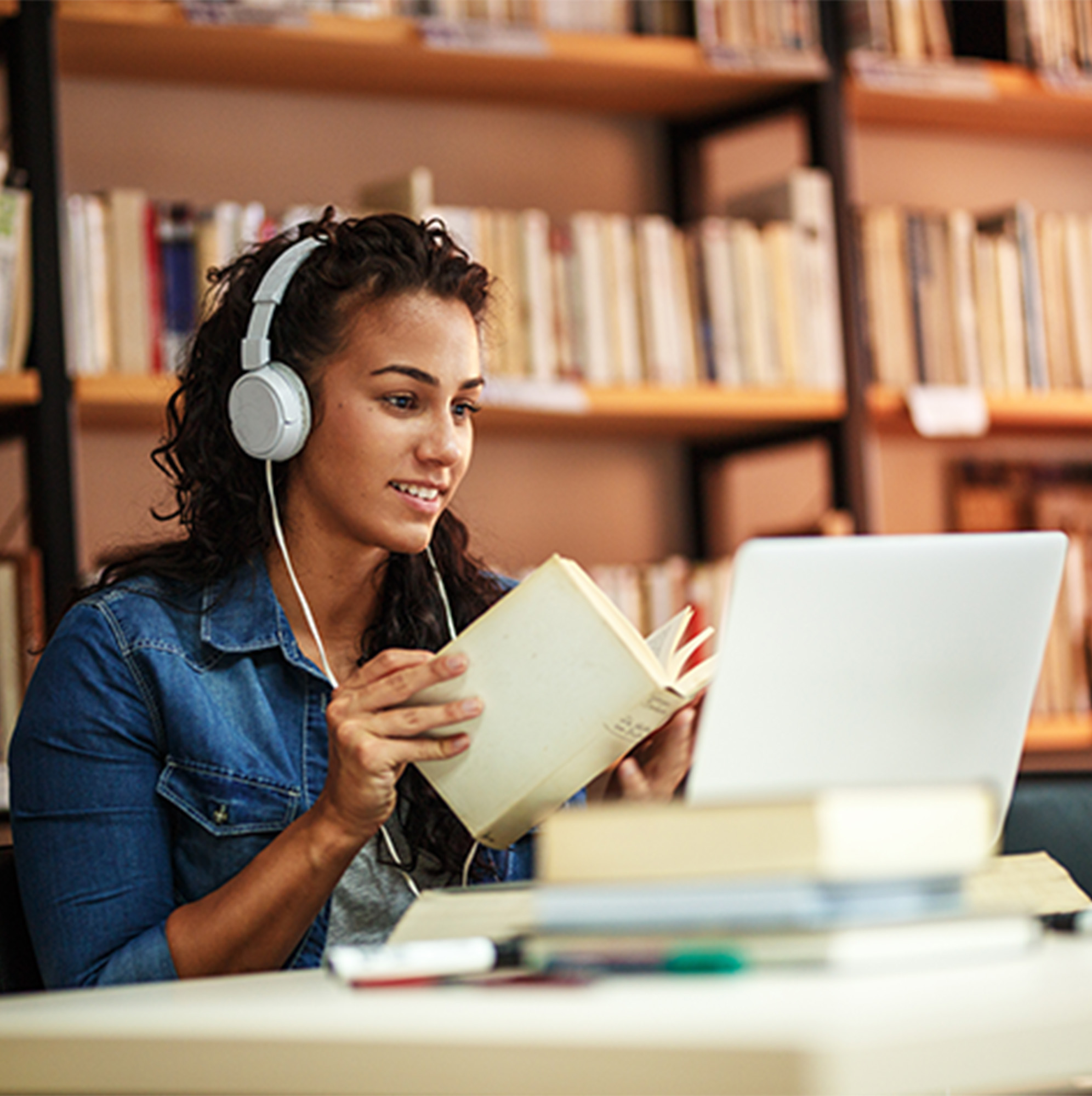 high school student studying in library